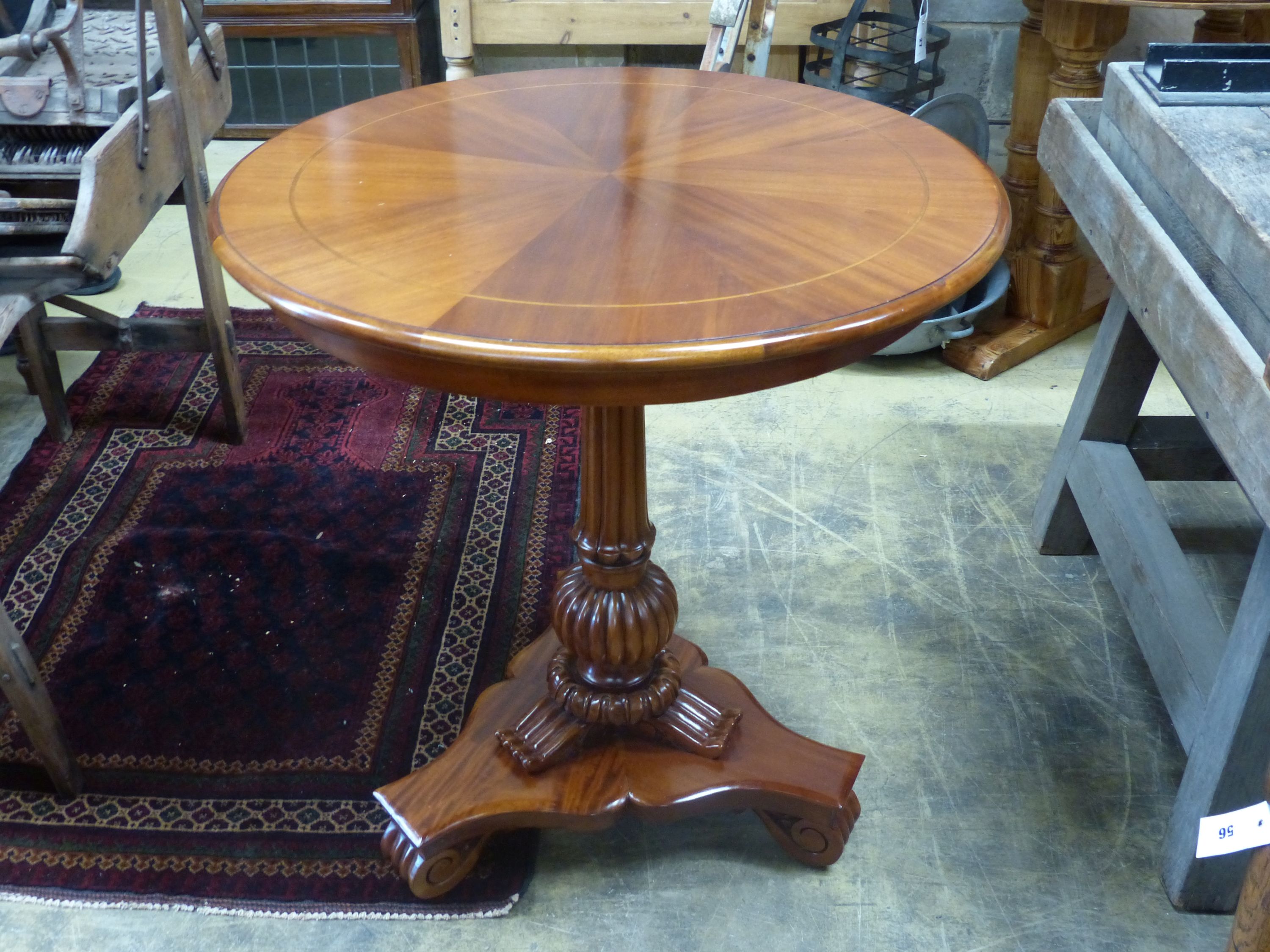 A William IV style mahogany tilt-top centre table